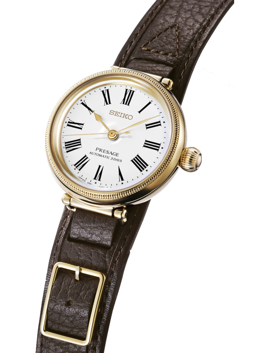 Side view of Seiko Presage wristwatch with stainless steel case, white dial, and cow leather strap.