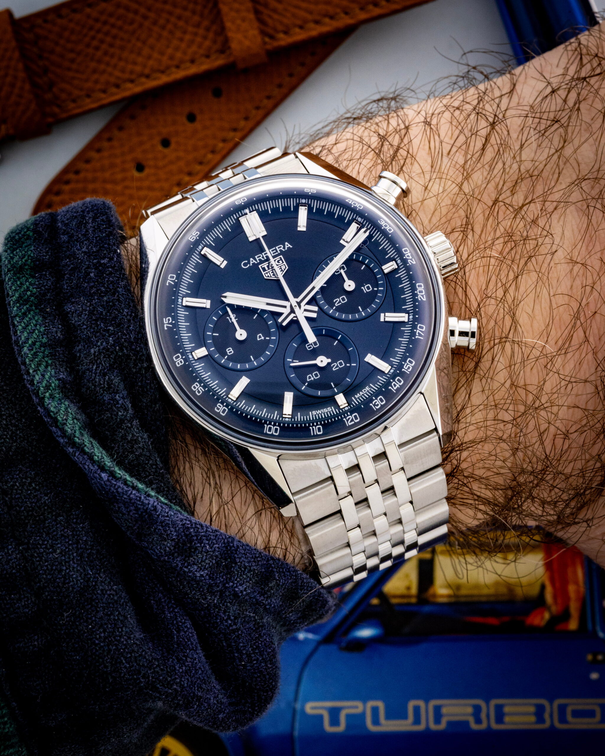 Hotlist image for Tag Heuer wristwatch with stainless steel case and bracelet, and blue dial.