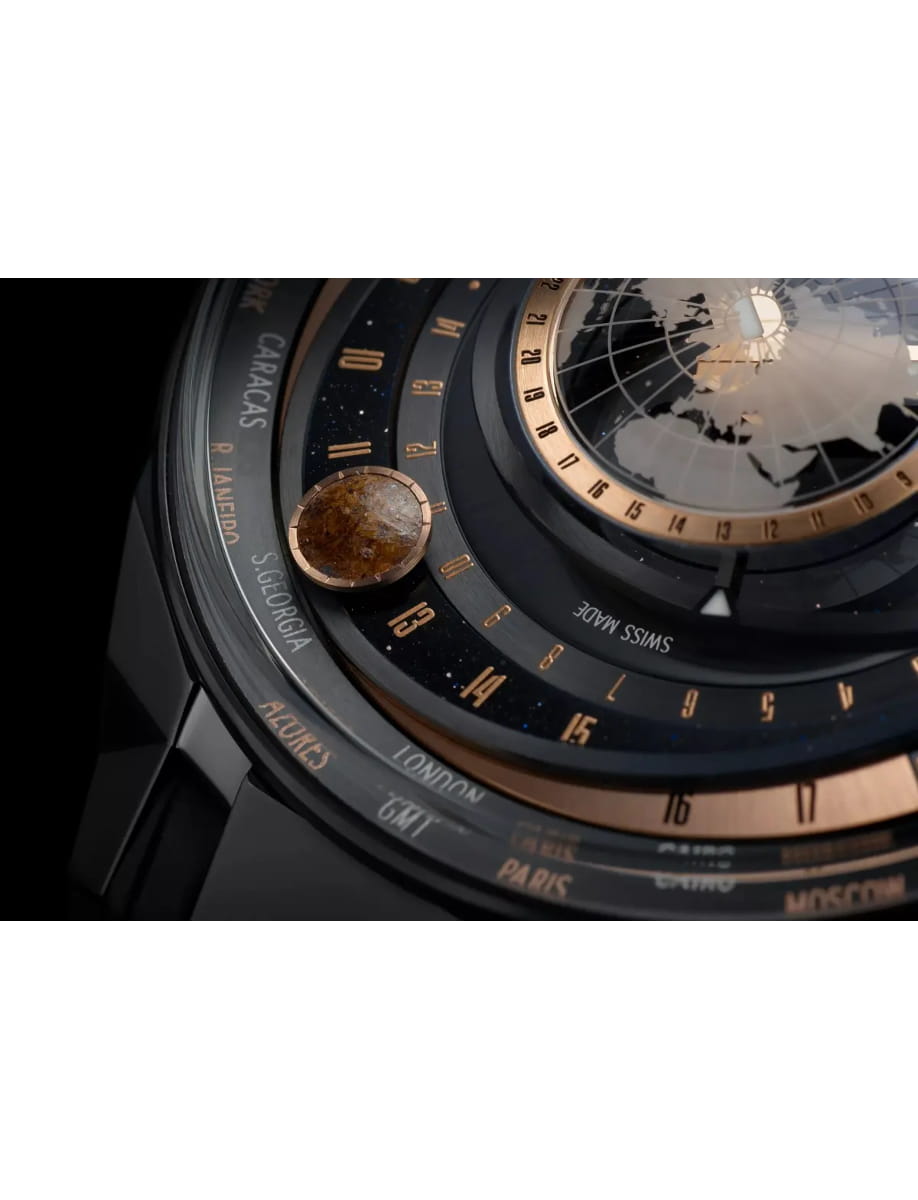 Closer look of Ulysse Nardin wristwatch with titanium / ceramic case, earth dial and rubber strap