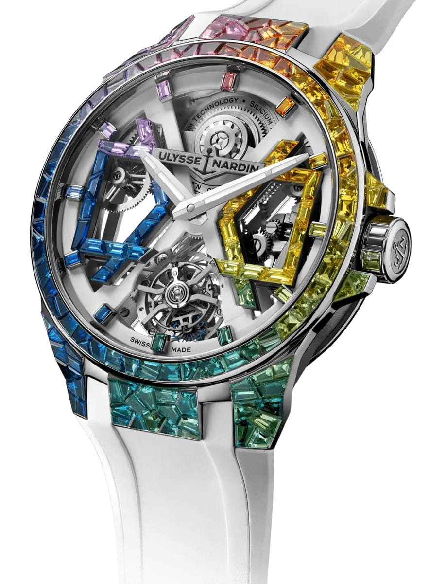 Side view of Ulysee Nardin wristwatch with 18k white gold case, openworked dial and white rubber strap