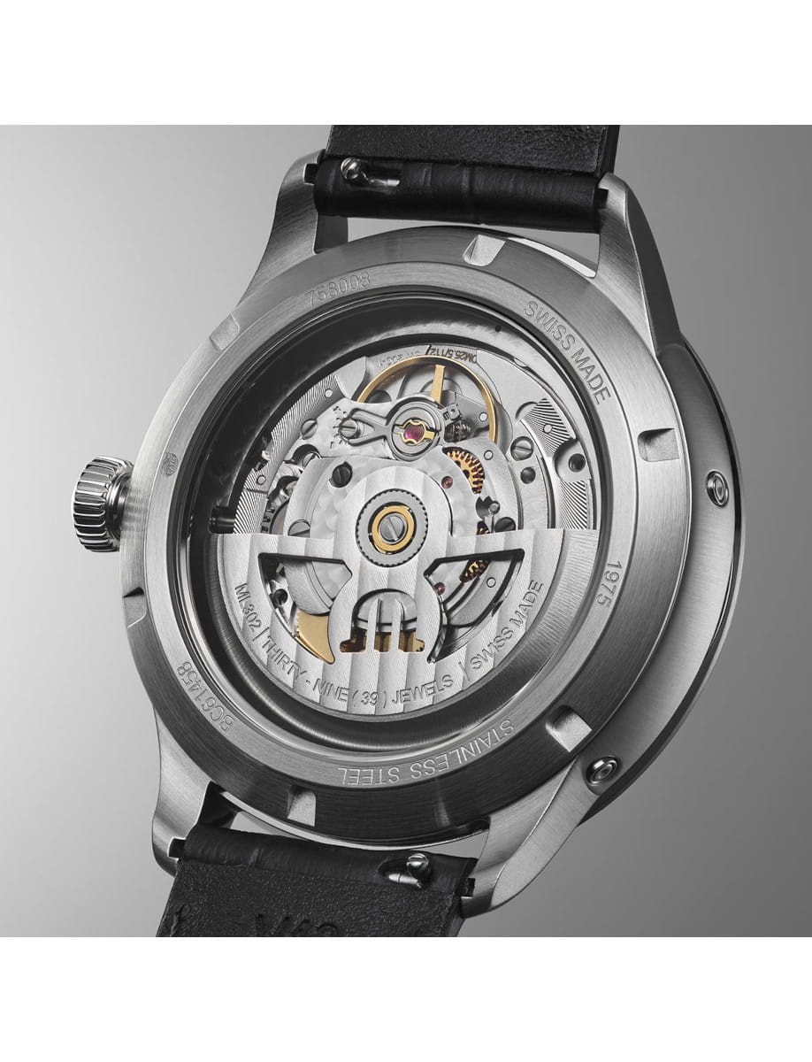 Back view of Maurice Lacroix 1975 wristwatch with stainless steel case, sapphire crystal dial, and black leather strap.