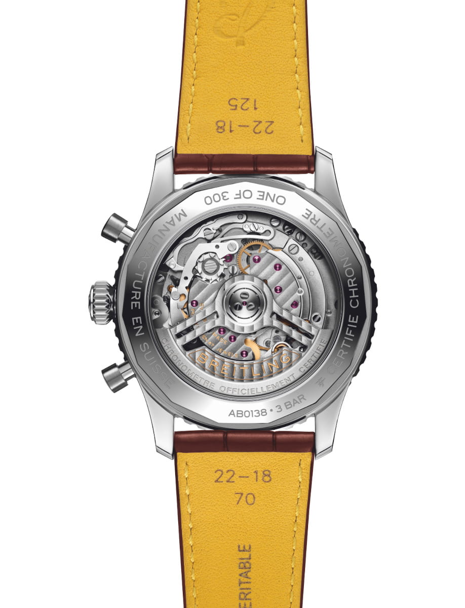 Back view of Breitling Navitimer B01 Chronograph 43 wristwatch with stainless steel case, open case back, and brown aligator leather.