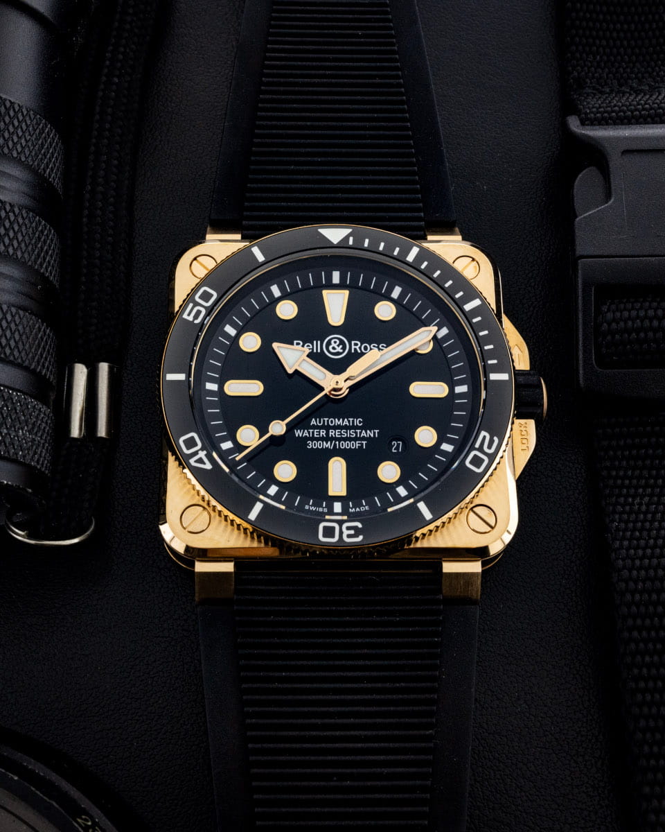 Hotlist image for Bell&Ross wristwatch with bronze case, black dial, and black rubber and ultra-resilient black synthetic fabric strap.