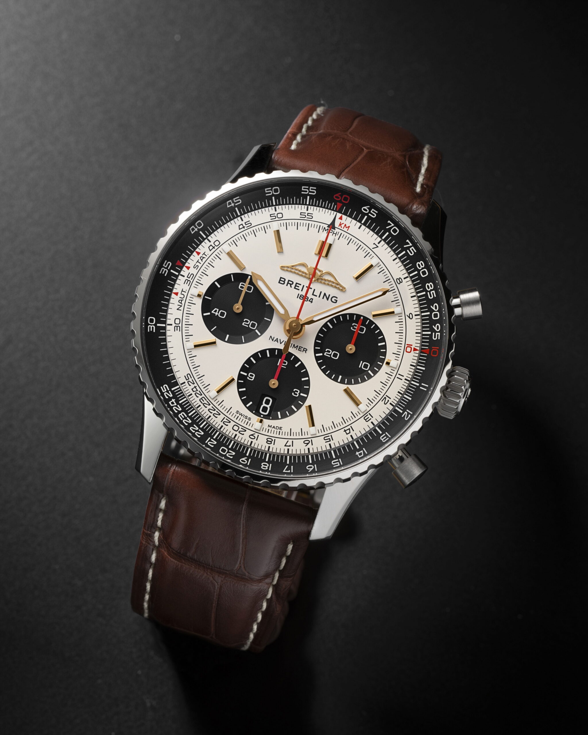Hotlist image for Breitling Navitimer B01 Chronograph 43 wristwatch with stainless steel case, silver dial with black subdials, and brown aligator leather.