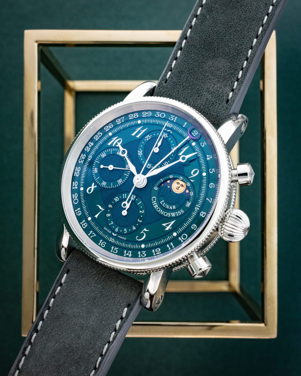 Hotlist image for Chronoswiss Lunar Chronograph wristwatch with stainless steel case, Guilloché-decorated dial, and dark leather nubuck leather.