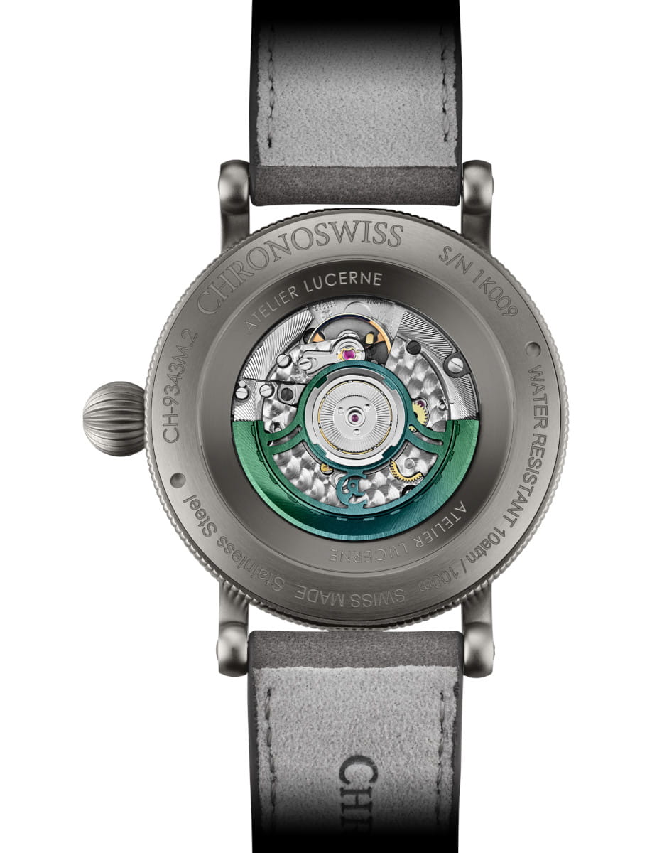 Back view of Chronoswiss wristwatch with stainless steel case, skeleton dial, and grey nubuck leather strap.