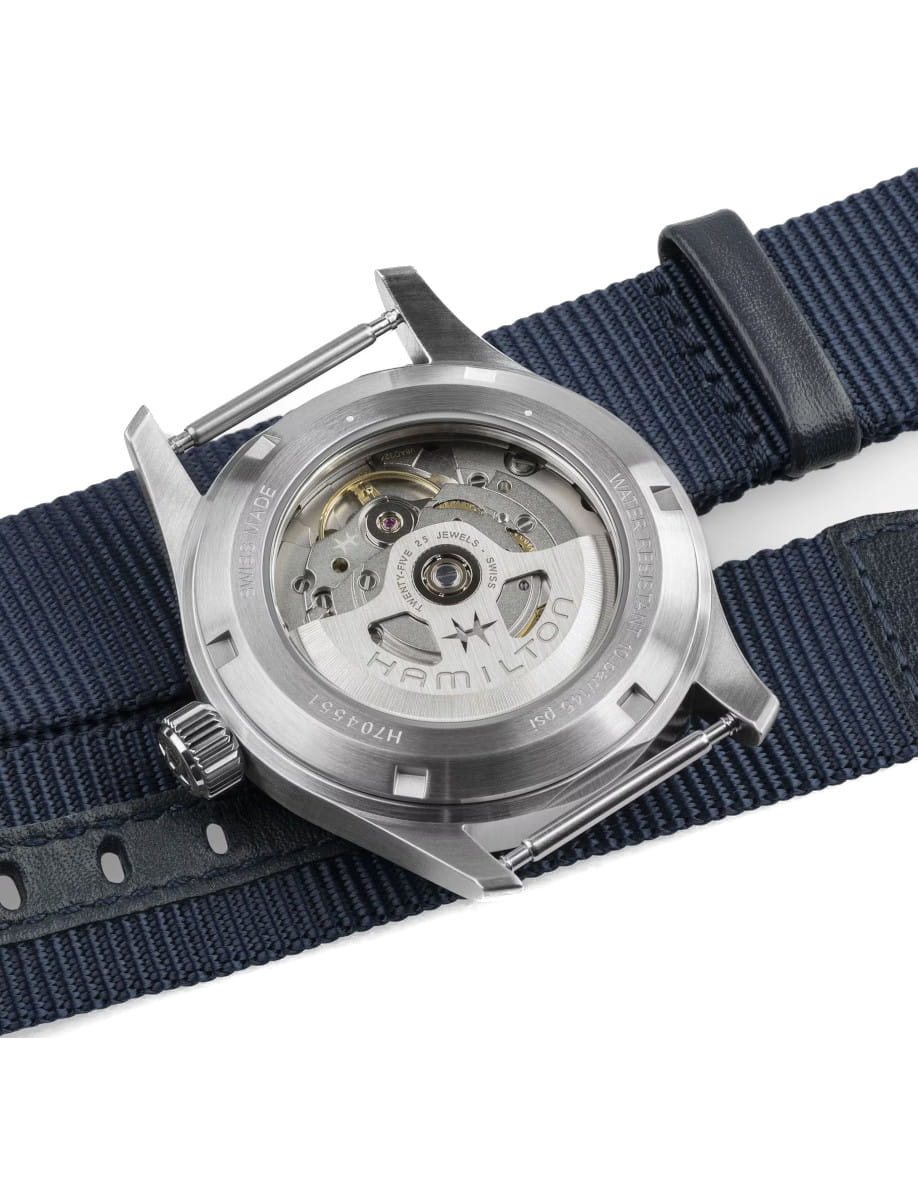 Back view of Hamilton Khaki Field wristwatch with stainless steel case, and blue textile strap.
