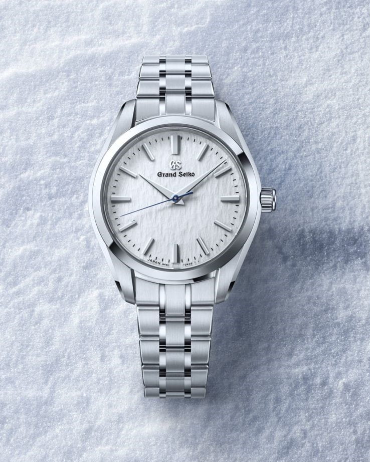 Hotlist image for Grand Seiko wristwatch with stainless steel case and bracelet, and pure white dial.