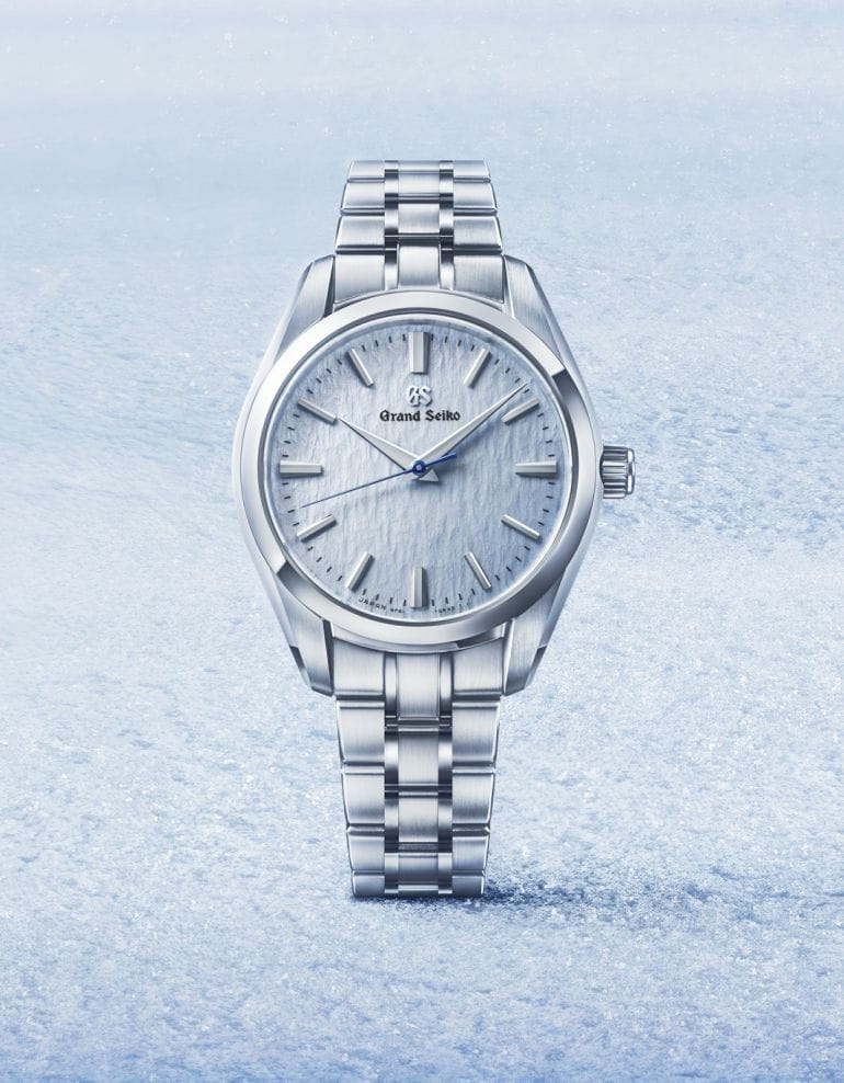 Hotlist image for Grand Seiko wristwatch with stainless steel case and bracelet, and light blue dial.