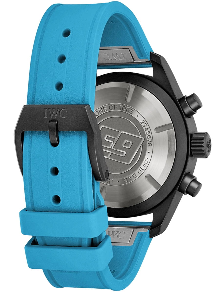 Back view of IWC Pilot's Watch Chronograph 41 George Russell wristwatch with black ceramic case, solid caseback, and blue rubber strap.