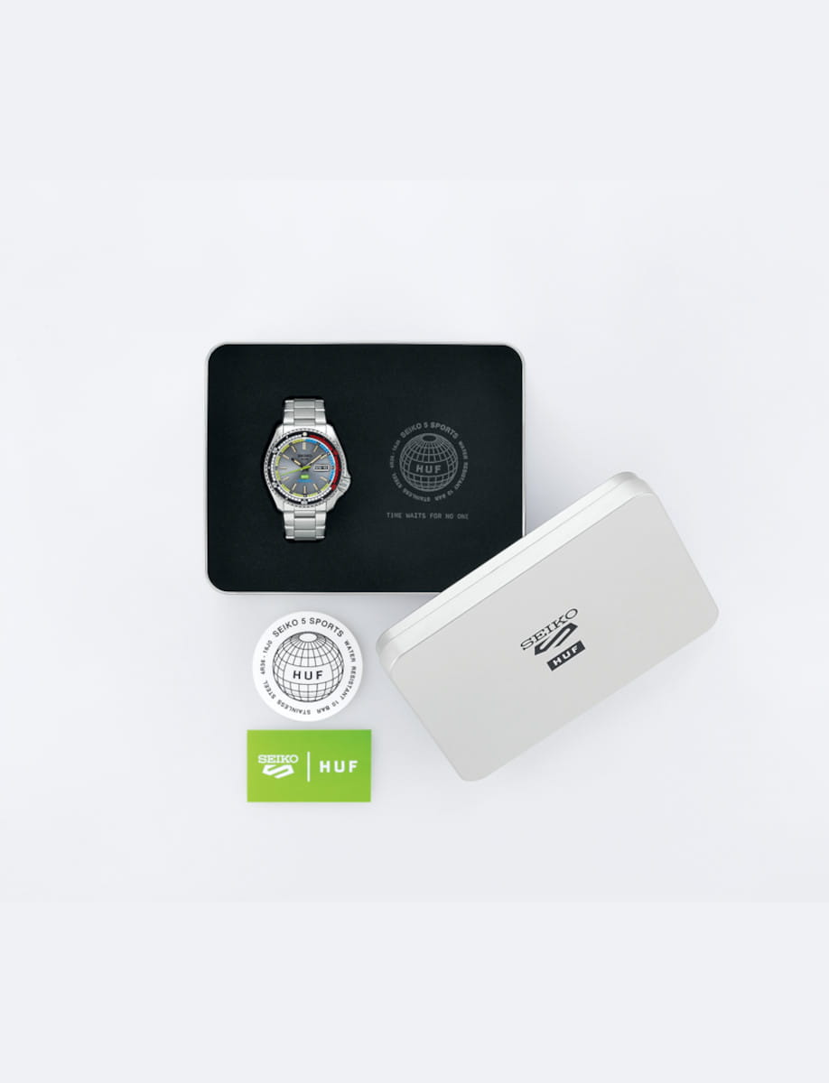 Box view of Seiko wristwatch with stainless steel case and bracelet.