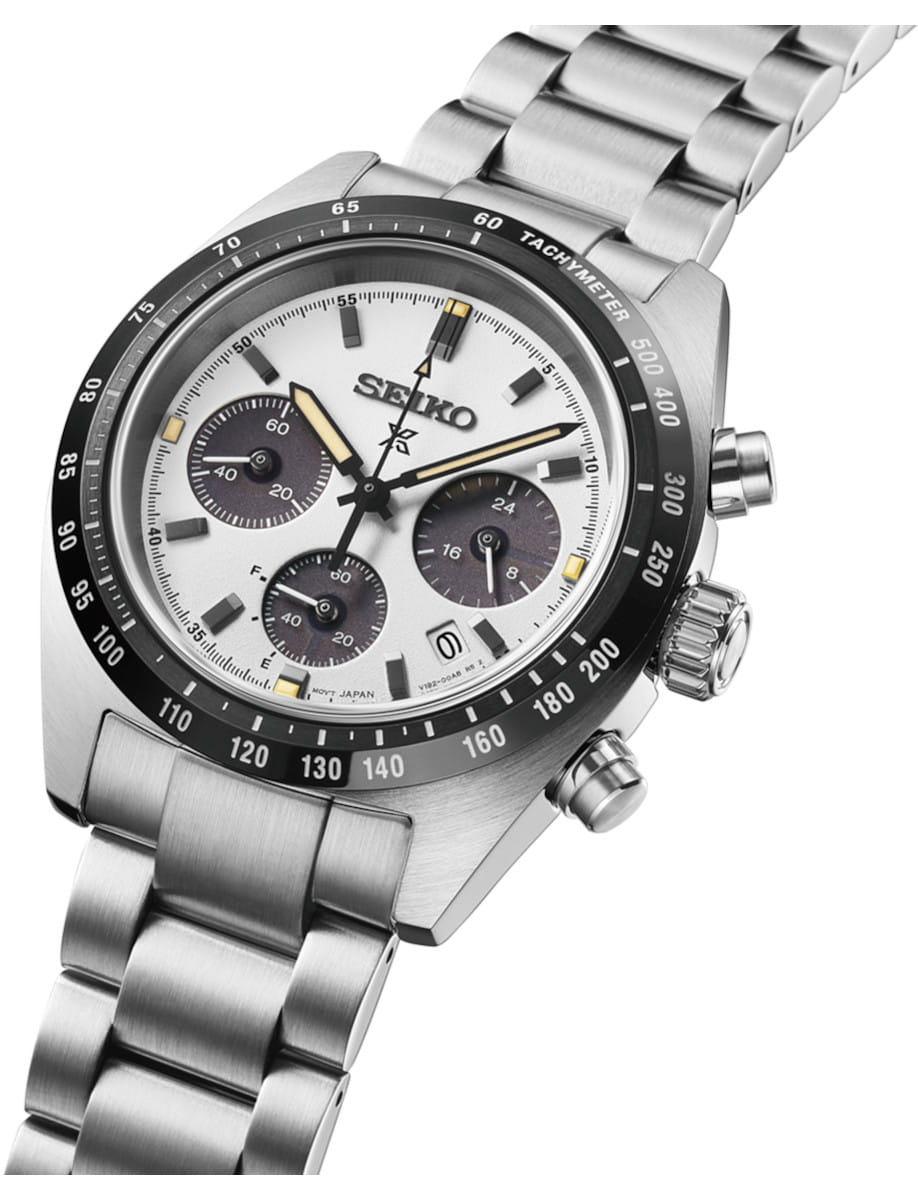 Side view of Seiko Prospex wristwatch with stainess steel case and bracelet, and white dial.