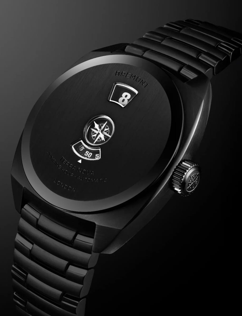 Side view of Bremont Terra Nova wristwatch with stainless steel case and bracelet, and black dial