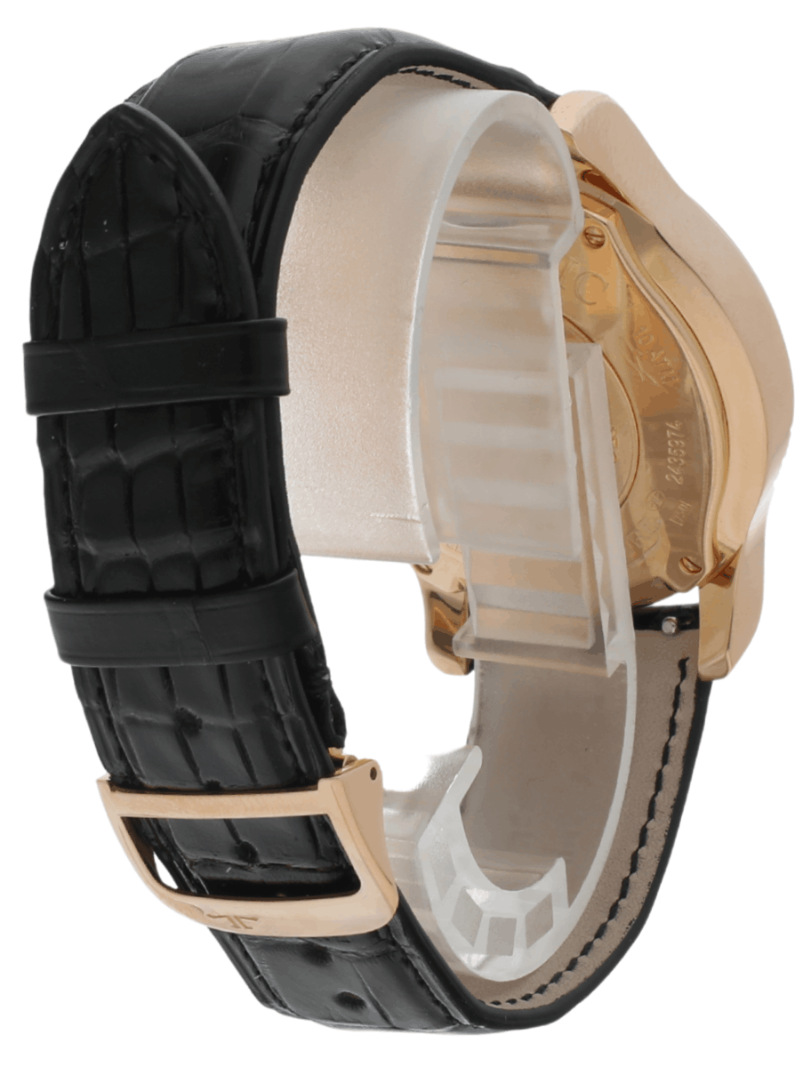 Right back side view of pre-owned JLC wristwatch with rose gold case, black dial, and alligator leather strap.