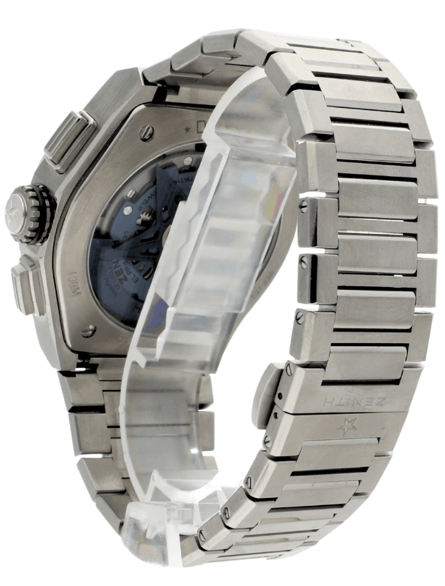 Back left side of pre-owned Zenith wristwatch with titanium case and bracelet, and blue dial.