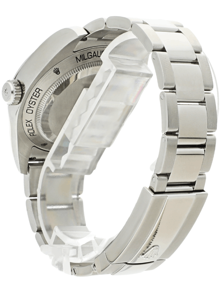 Back left side view for pre-owned Rolex wristwatch with stainless steel case and bracelet, and blue dial.