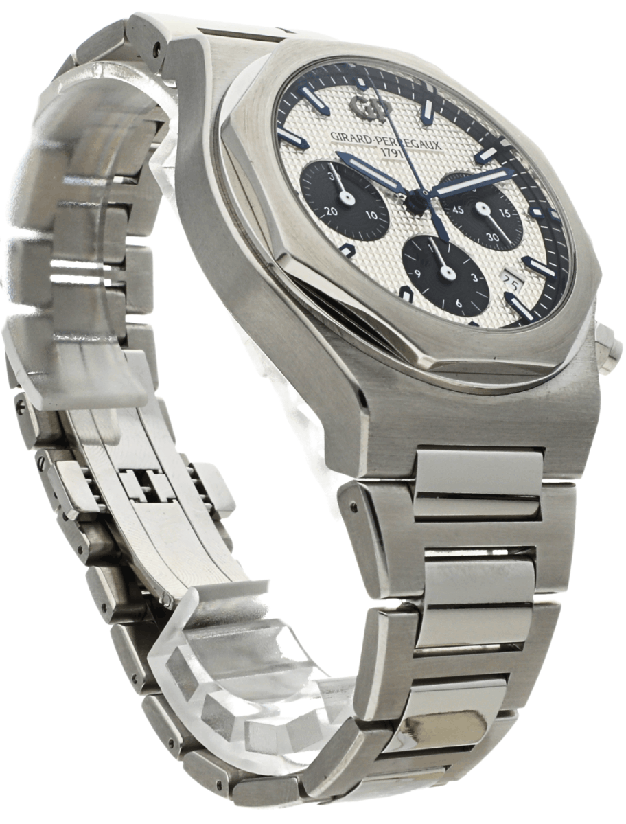 Front right side view of pre-owned Girard-Perregaux wristwatch with stainless steel case and bracelet, and silver dial.