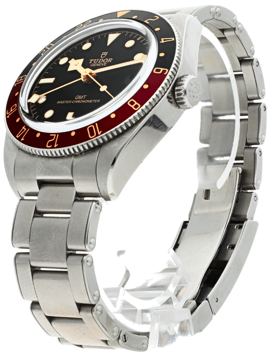 Front left side view of pre-owned Tudor wristwatch with stainless steel case and bracelet, and black dial.