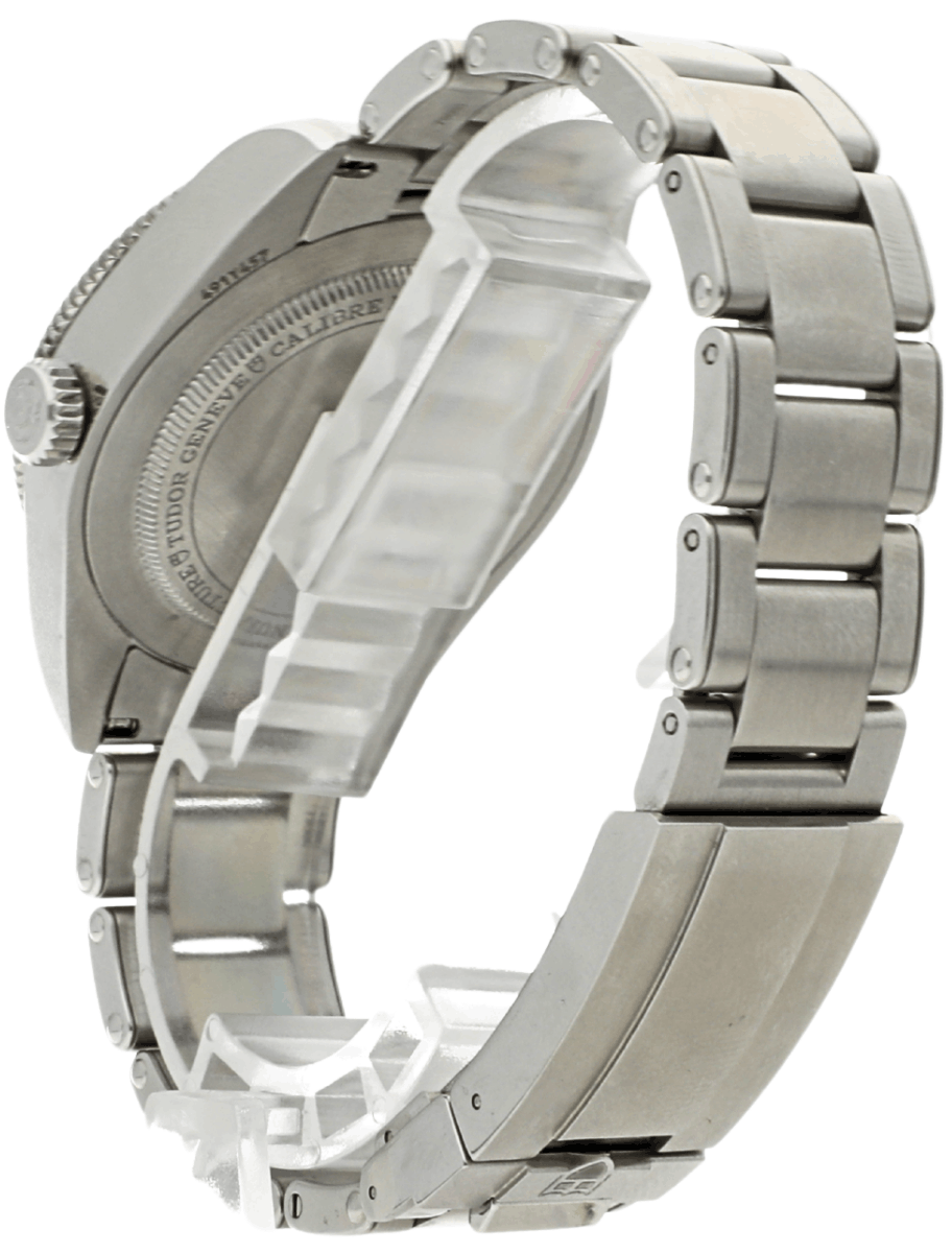 Back left side view of pre-owned Tudor wristwatch with stainless steel case and bracelet, and black dial.