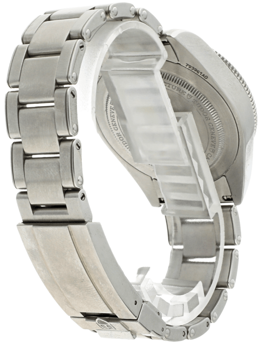 Back right side view of pre-owned Tudor wristwatch with stainless steel case and bracelet, and black dial.