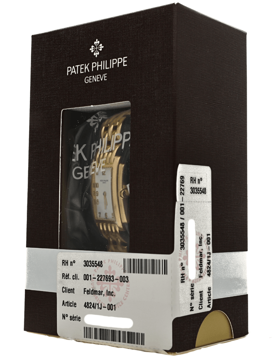 Side view of pre-owned Patek Phillipe with yellow gold case and bracelet, and white dial.