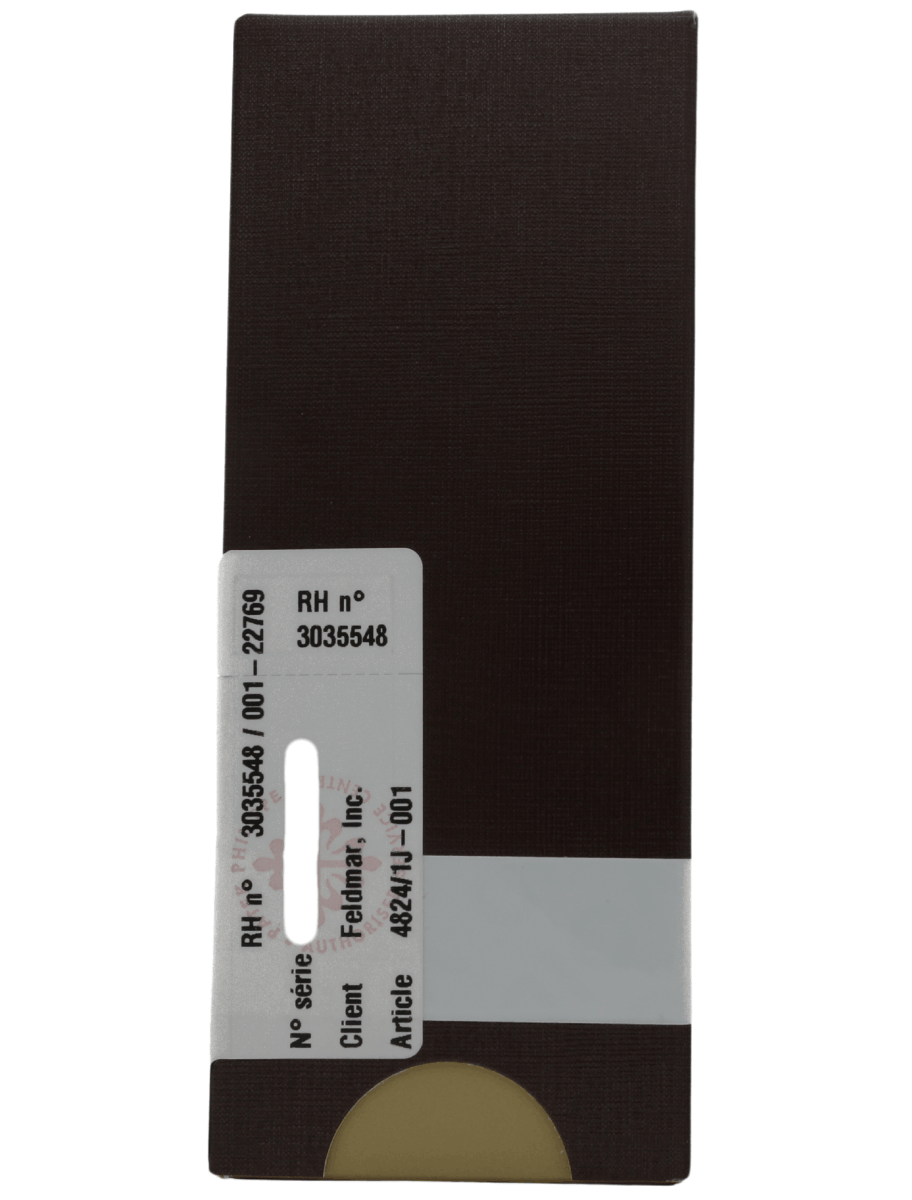 Side view of pre-owned Patek Phillipe with yellow gold case and bracelet, and white dial.