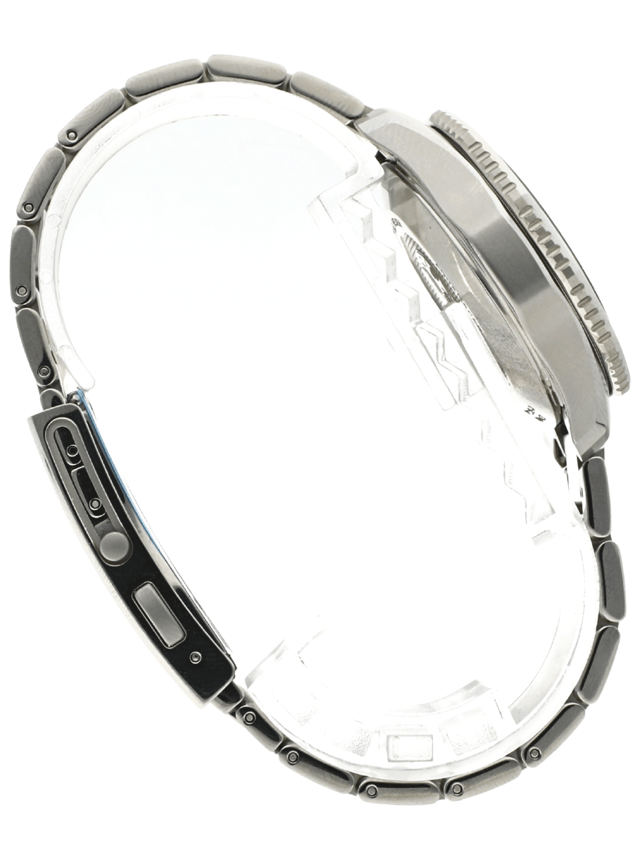 Right side view of pre-owned Tag Heuer wristwatch with stainless steel case and bracelet, and blue dial.