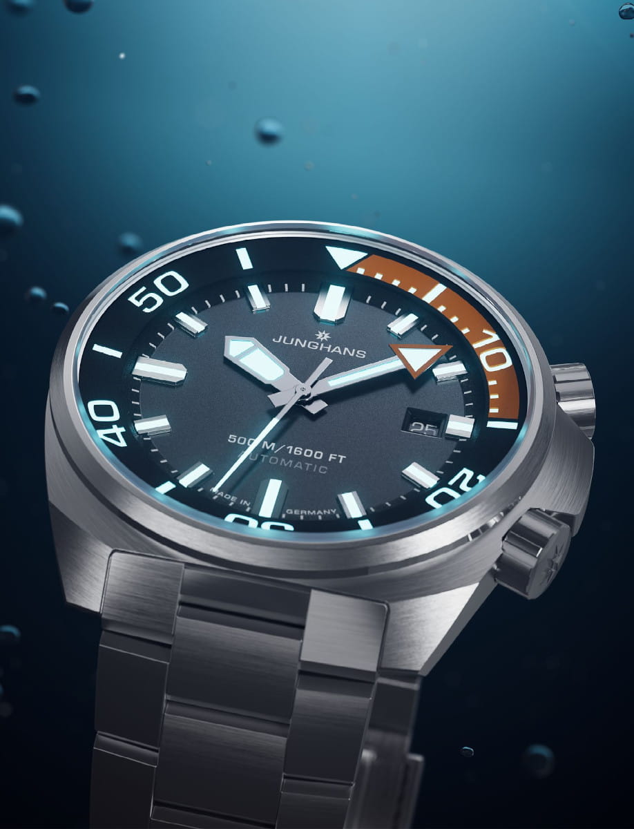 Side view of Junghans wristwatch with stainless steel case and bracelet, matt dark grey dial.