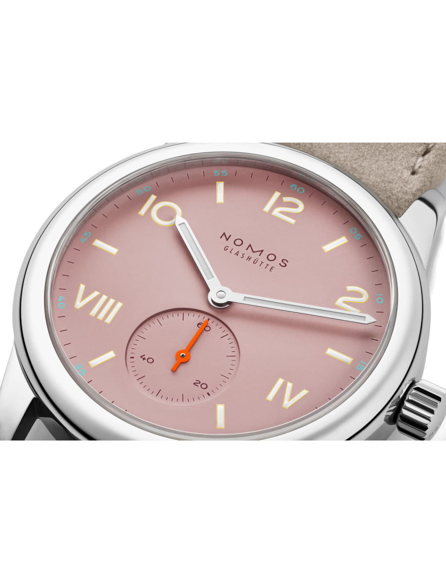 Front side view of Nomos Club Campus All Olive wristwatch with stainless steel case, rose color dial, Vegan velour remborde beige strap.