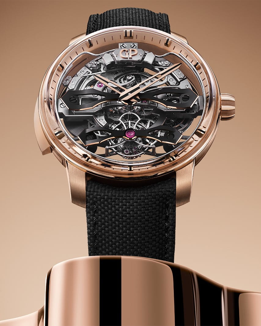 Hotlist image for Girard-Perregaux wristwatch with pink gold case, openworked dial, and black rubber strap.
