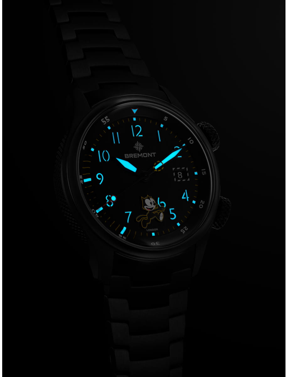 Night view of Bremont wristwatch with titanium case and bracelet and black dial