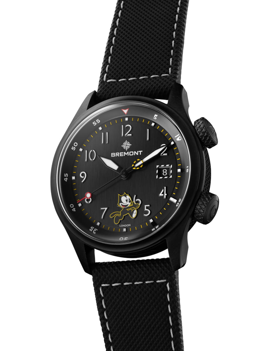 Side view of Bremont wristwatch with titanium case, black dial and black rubber & leather embossed strap