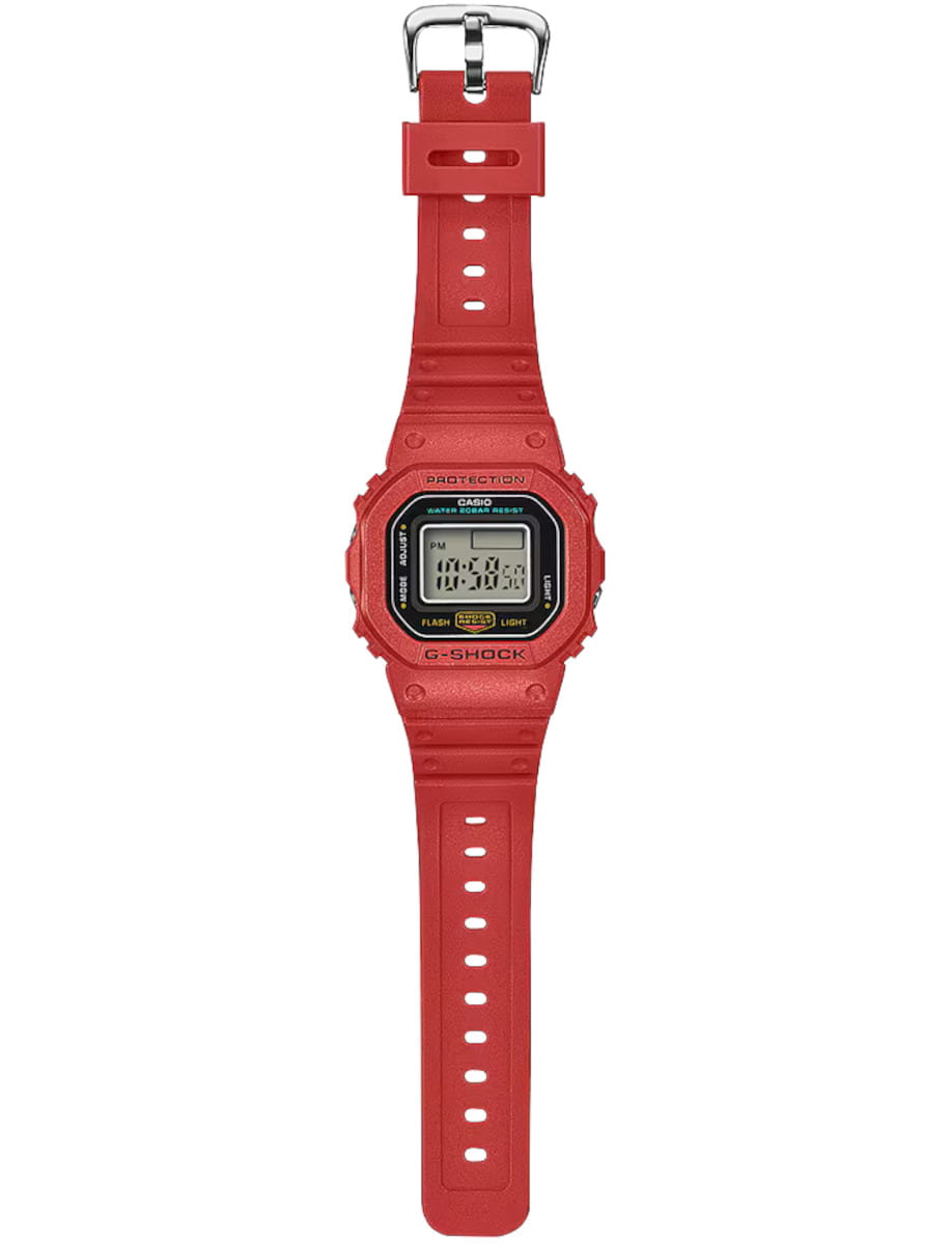Full view of G-Shock wristwatch with red resin and bio-based resin case and bracelet, and digital display.