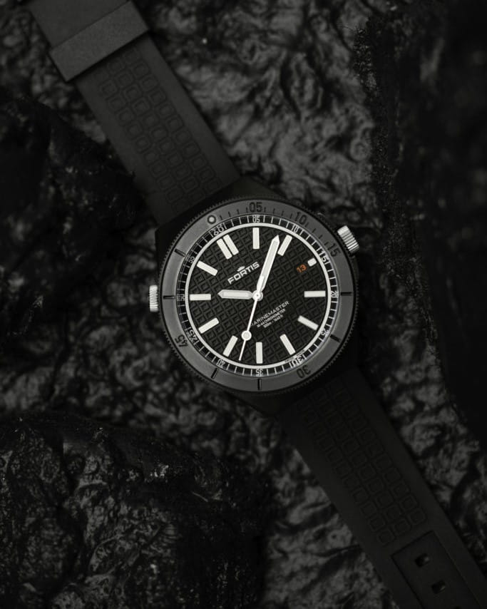 Hotlist image for Fortis wristwatch with DLC Dianoir® and regular Stainless Steel case, Black dial with Fortis O-pattern with applied Superluminova®X1 Markers, and Hypoallergenic FKM rubber strap.