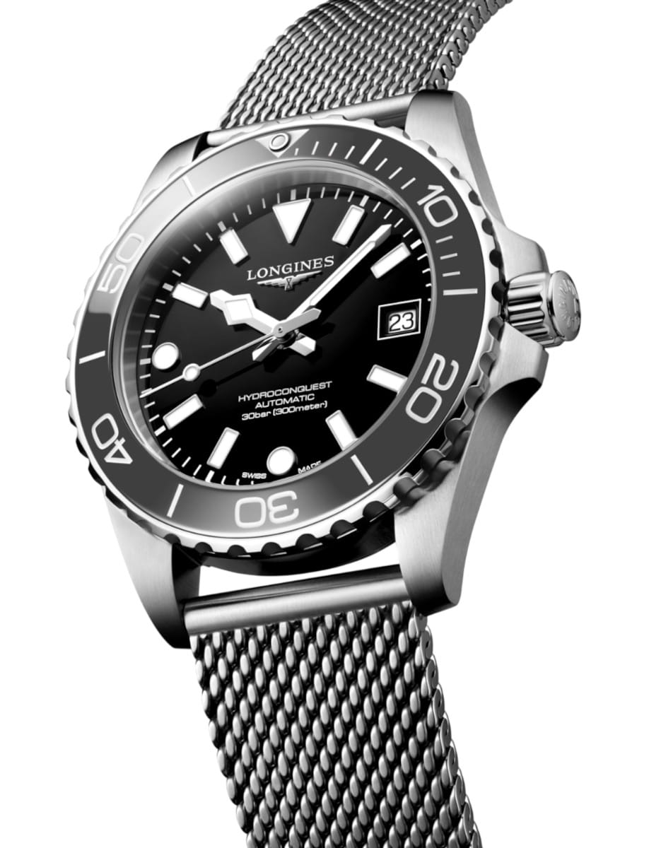 Side view of Longines Hydroconquest wristwatch with stainless steel case and bracelet, and black dial.