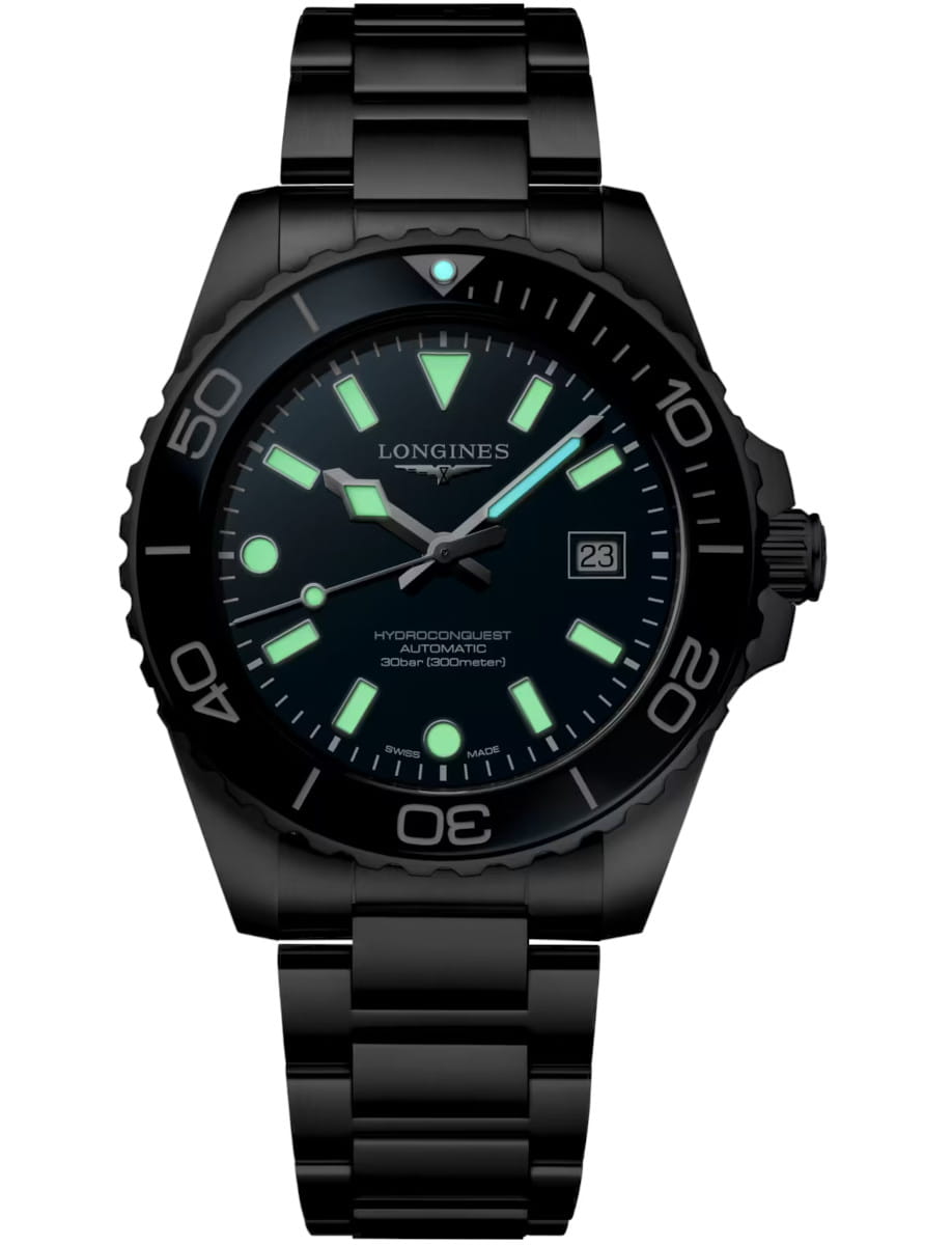 Night view of Longines Hydroconquest wristwatch with stainless steel case and bracelet, and blue dial.