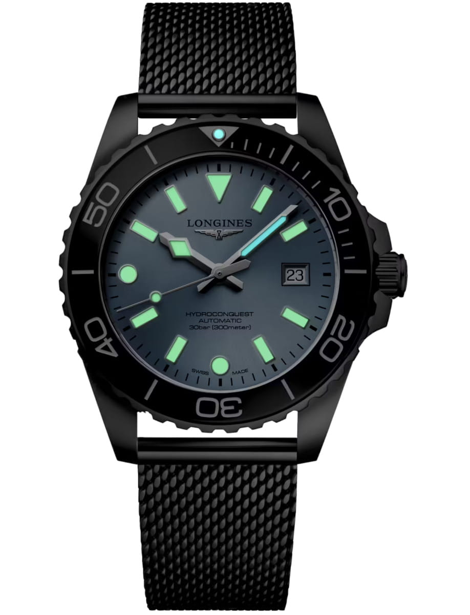 Night view of Longines Hydroconquest wristwatch with stainless steel case and bracelet, and frosted blue dial.
