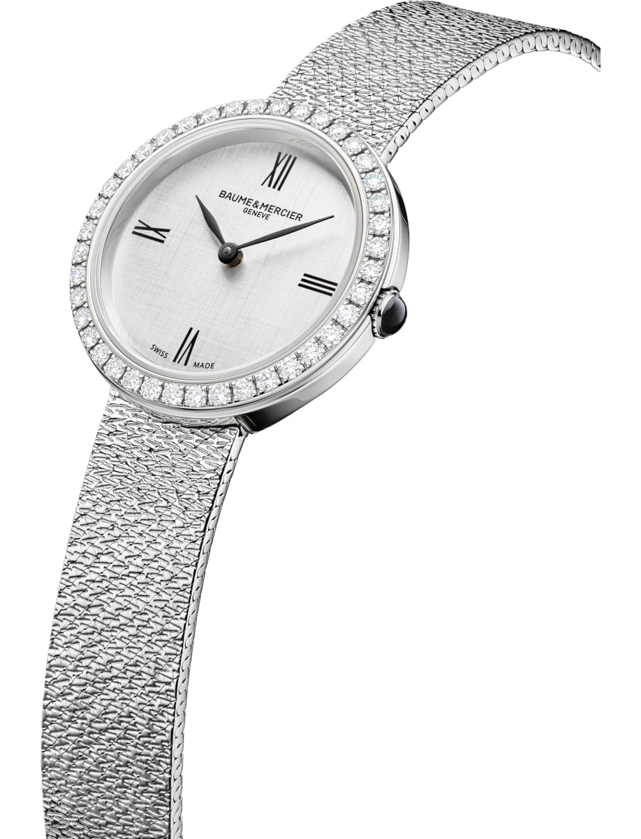 Side view of Baume & Mercier wristwatch with stainless steel case and bracelet and silver dial