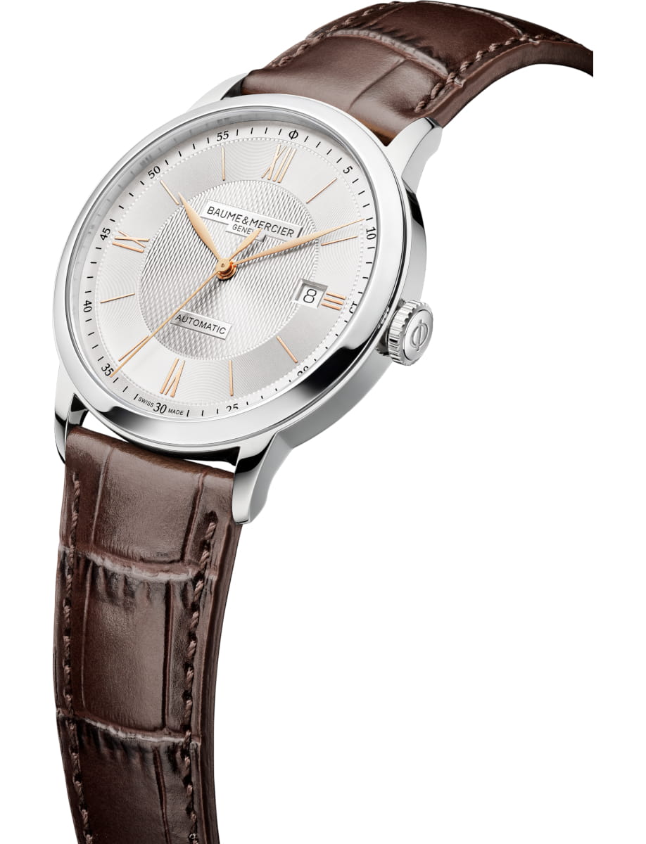 Side view of Baume & Mercier wristwatch with stainless steel case, silver dial and calfskin leather strap
