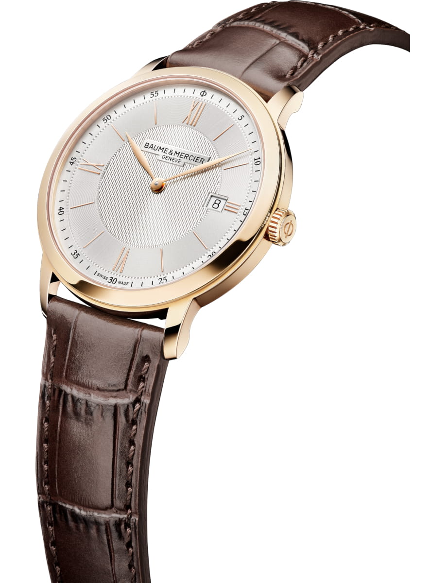 Side view of Baume & Mercier wristwatch with PVD stainless steel case, silver dial and domestic calf leather strap