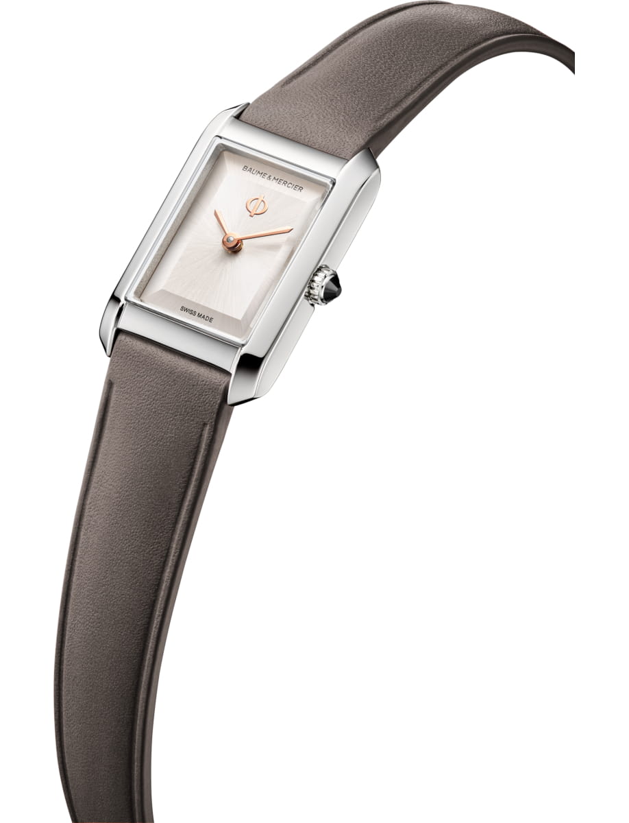 Side view of Baume & Mercier wristwatch with stainless steel case, warm silver dial and caflskin leather strap