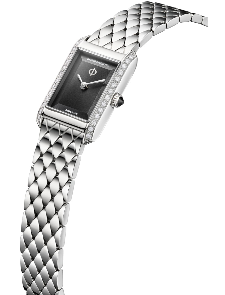 Side view of Baume & Mercier wristwatch with stainless steel case and bracelet and black dial