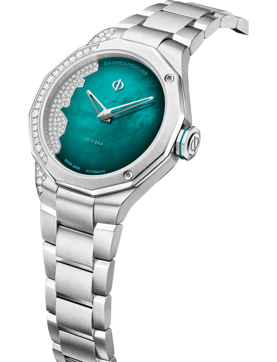 Side view of Baume & Mercier wristwatch with stainless steel case and bracelet and green dial