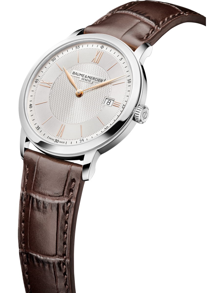 Side view of Baume & Mercier wristwatch with stainless steel case, silver dial and brown calfskin leather strap