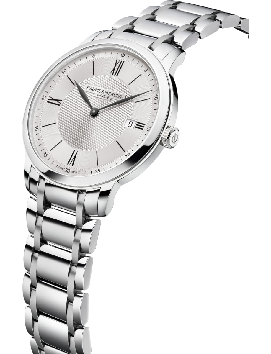 Side view of Baume & Mercier wristwatch with stainless steel case and bracelet and silver dial