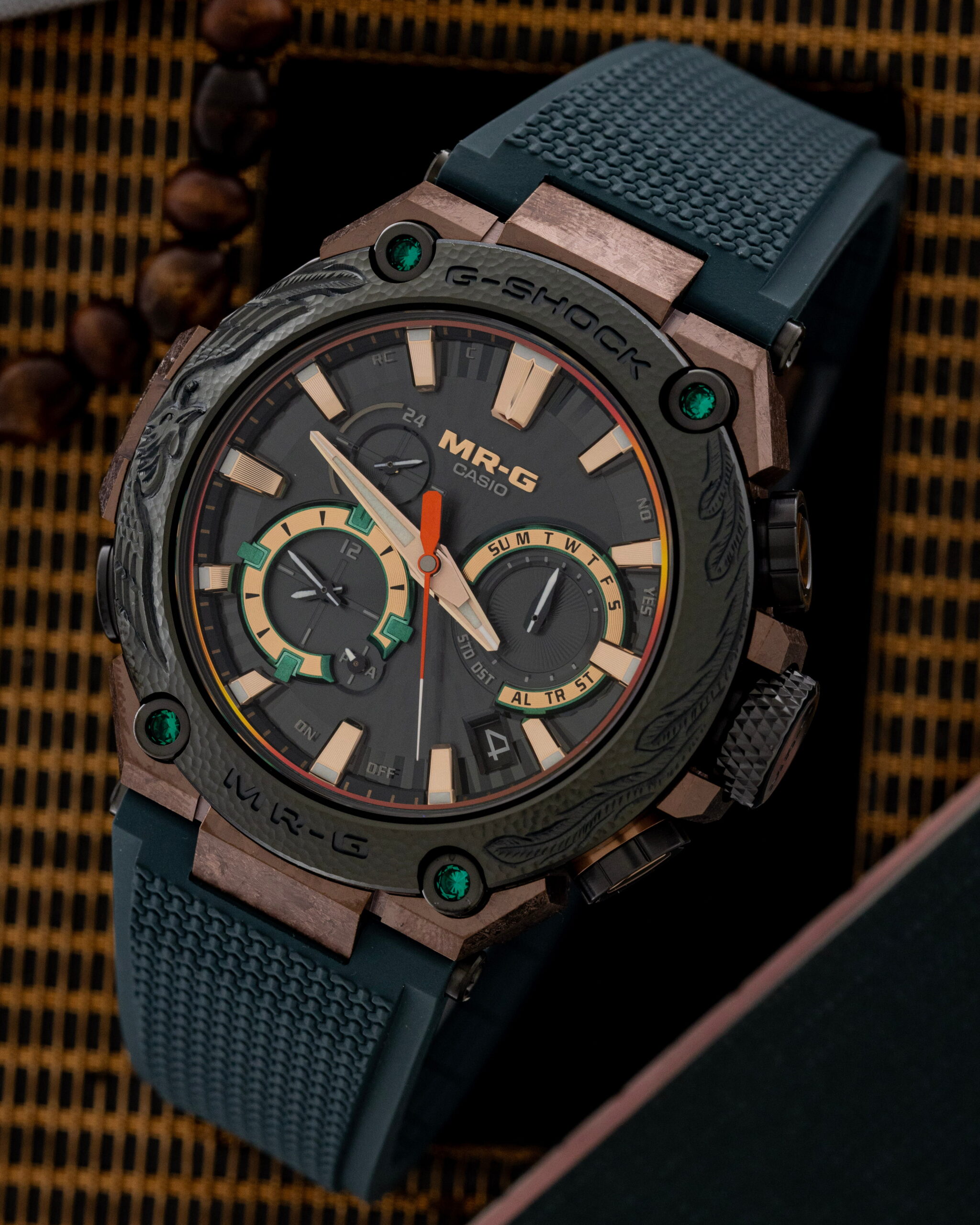 Hotlist image for G-Shock wristwatch with titanium case, black dial, and dark green Dura Soft rubber strap.