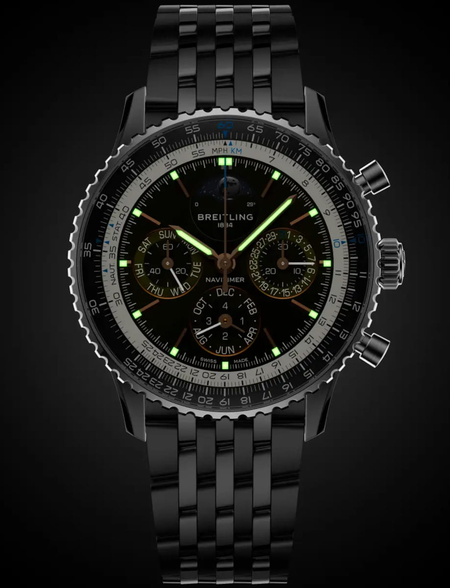 Breitling Navitimer wristwatch with stainless steel case and bracelet, platinum bezel, and anthracite dial with luminous hands and markers.