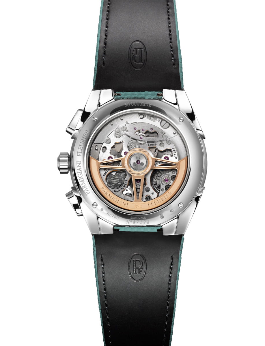 Front side view of Parmigiani Fleurier wristwatch with stainless steel case, open case back, “Verzasca” hue rubber strap.