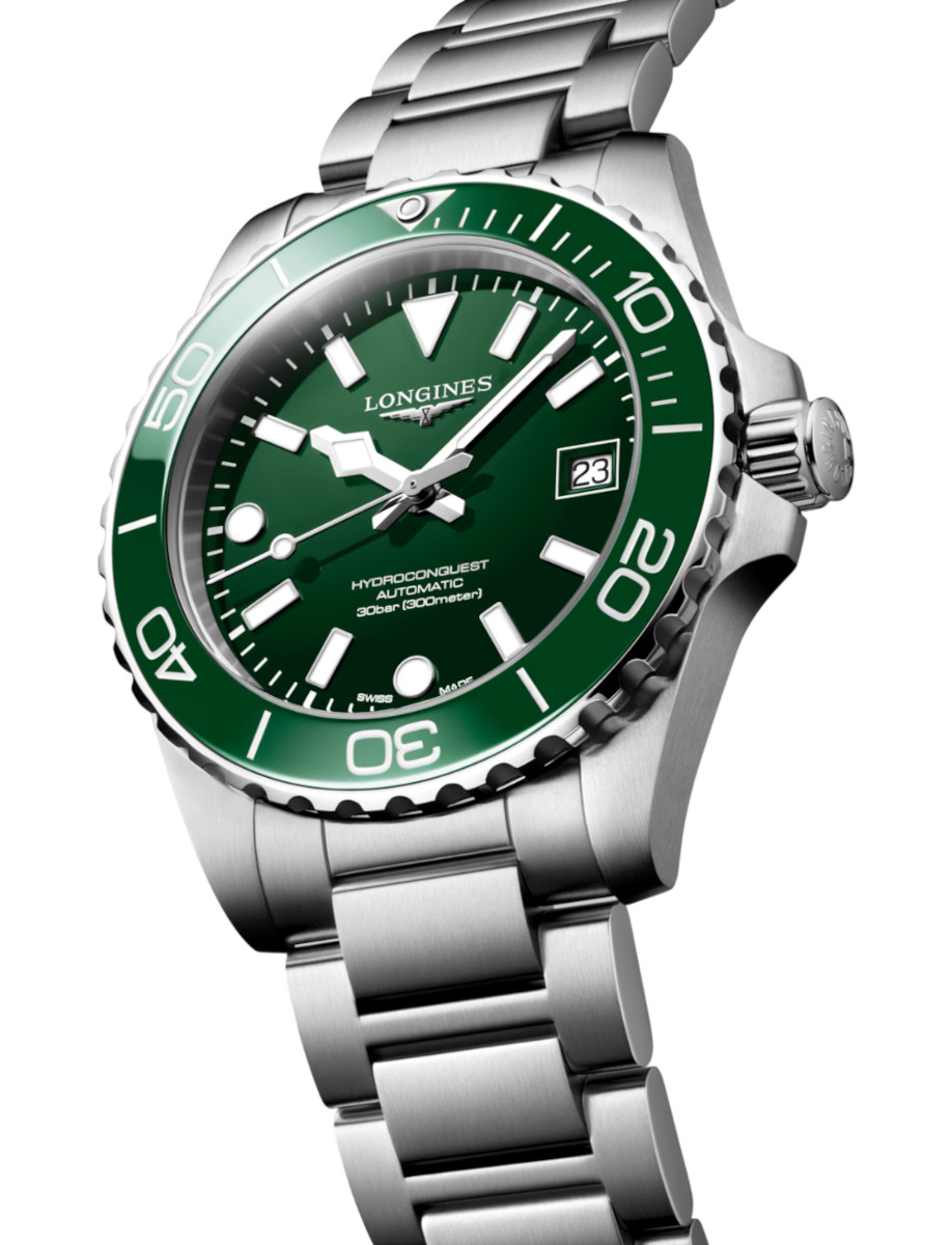 Side view of Longines Hydroconquest wristwatch with stainless steel case and bracelet, and green dial.
