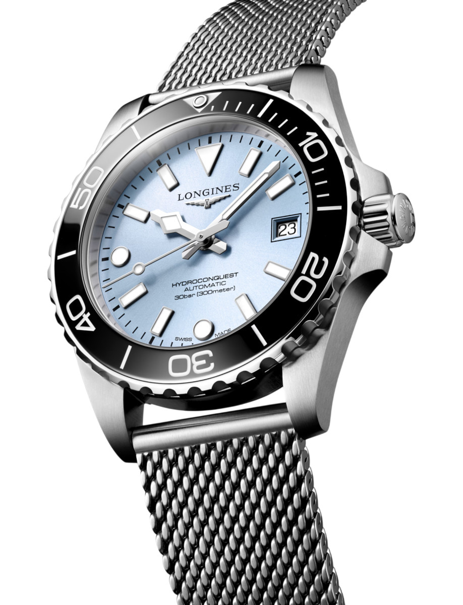 Side view of Longines Hydroconquest wristwatch with stainless steel case and bracelet, and frosted blue dial.